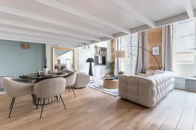 Coin salon dans l'établissement MDOR - Atoll - Appt au cœur de Lyon