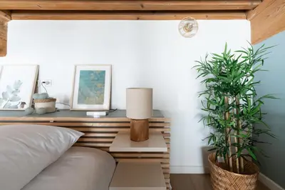 Coin salon dans l'établissement MDOR - Atoll - Appt au cœur de Lyon
