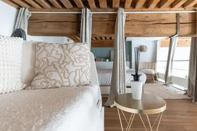 Coin salon dans l'établissement MDOR - Atoll - Appt au cœur de Lyon