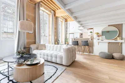 Coin salon dans l'établissement MDOR - Atoll - Appt au cœur de Lyon
