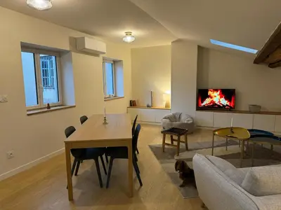 Télévision ou salle de divertissement dans l'établissement Romance