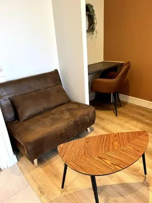 Coin salon dans l'établissement Le Cosy Shelby Proche gare 150m
