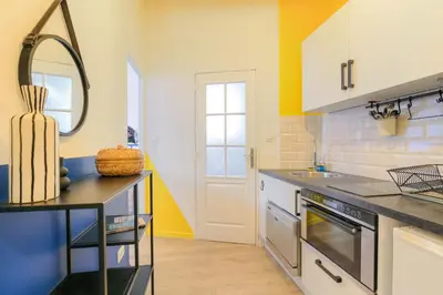Cuisine ou kitchenette dans l'établissement Cosy et Design en hypercentre
