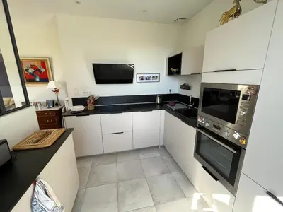 Cuisine ou kitchenette dans l'établissement Saint Cyr