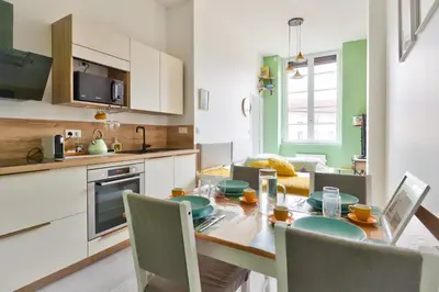 Cuisine ou kitchenette dans l'établissement Charmant appartement à Vaise