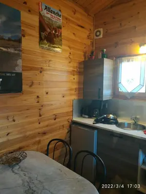 Cuisine ou kitchenette dans l'établissement CHALET porte PILAT