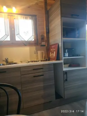 Cuisine ou kitchenette dans l'établissement CHALET porte PILAT