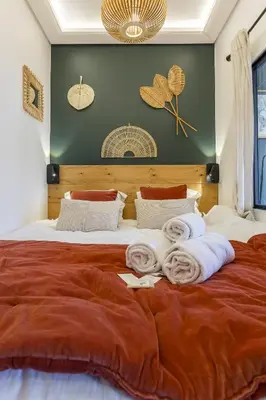 Un ou plusieurs lits dans un hébergement de l'établissement SmartStay Capsule Cosy - Lyon Centre