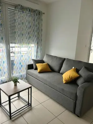 Coin salon dans l'établissement Chez Omiala Centre de Meyzieu