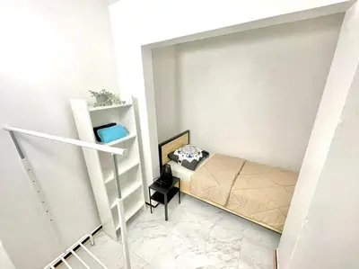 Un ou plusieurs lits dans un hébergement de l'établissement Appartement spacieux et moderne