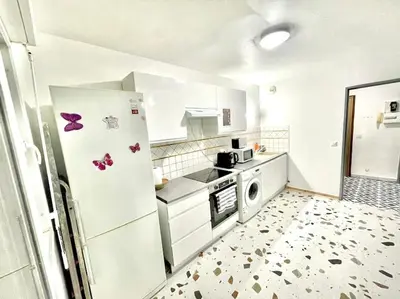Cuisine ou kitchenette dans l'établissement Appartement spacieux et moderne