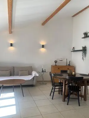 Coin salon dans l'établissement Charmante Maisonnette au calme, proche de Lyon