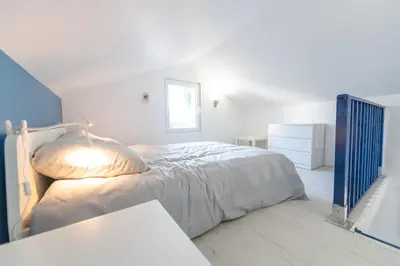 Un ou plusieurs lits dans un hébergement de l'établissement Baiona - Maison - Extérieur