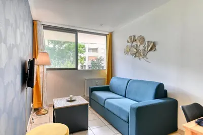 Coin salon dans l'établissement Apartment - 4P - Villeurbanne