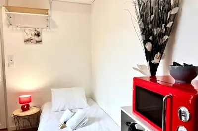 Un ou plusieurs lits dans un hébergement de l'établissement La Studette - Deux pas du quartier Gratte-Ciel