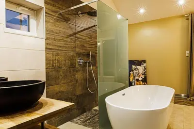 Salle de bains dans l'établissement Villa Meyzieu Grand Large