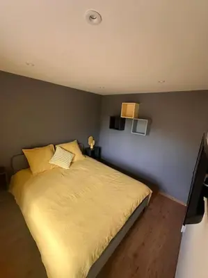 Un ou plusieurs lits dans un hébergement de l'établissement Petite maison de village 2