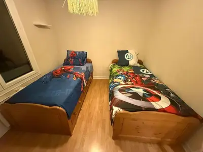 Un ou plusieurs lits dans un hébergement de l'établissement Appartement spacieux