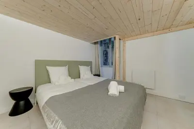 Un ou plusieurs lits dans un hébergement de l'établissement NOCNOC Le Balme
