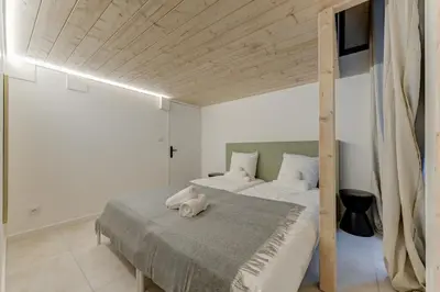 Un ou plusieurs lits dans un hébergement de l'établissement NOCNOC Le Balme