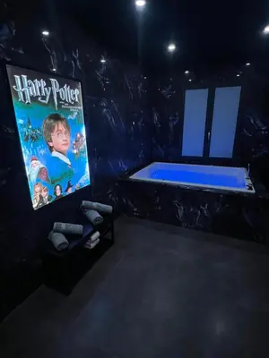 Salle de jeux dans l'établissement Cinéma & Jacuzzi