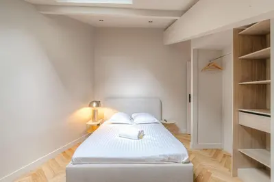 Un ou plusieurs lits dans un hébergement de l'établissement Charmant appartement en duplex pour 4, St-Didier