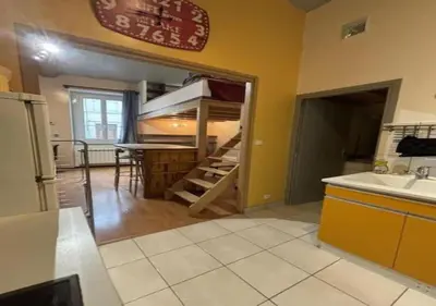 Cuisine ou kitchenette dans l'établissement Appartement au centre de Tarare