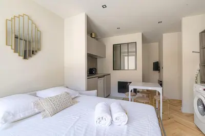 Un ou plusieurs lits dans un hébergement de l'établissement Studio with sleeping area for 4, Saint-Didier