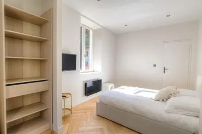 Un ou plusieurs lits dans un hébergement de l'établissement Joli appartement T2, bien équipé, Saint-Didier
