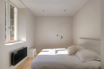 Un ou plusieurs lits dans un hébergement de l'établissement Joli appartement T2, bien équipé, Saint-Didier
