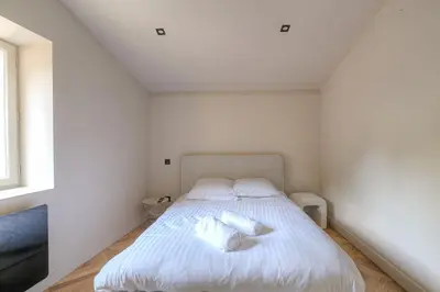 Un ou plusieurs lits dans un hébergement de l'établissement Appartement T3 dans résidence calme, Saint-Didier