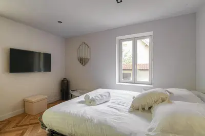 Un ou plusieurs lits dans un hébergement de l'établissement Appartement T3 dans résidence calme, Saint-Didier
