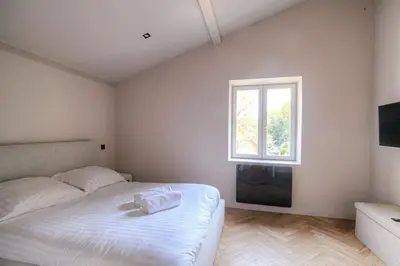 Un ou plusieurs lits dans un hébergement de l'établissement Appartement T3 dans résidence calme, Saint-Didier