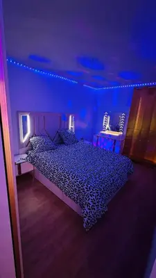 Un ou plusieurs lits dans un hébergement de l'établissement Appartement Luxueux de haut standing au cœur de Lyon avec une terrasse