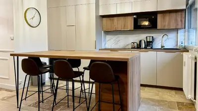 Cuisine ou kitchenette dans l'établissement Le chic à la Caladoise avec balcon