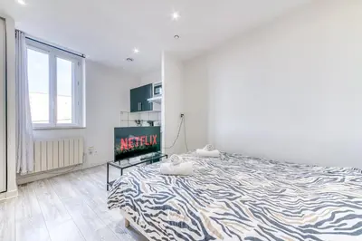 Un ou plusieurs lits dans un hébergement de l'établissement Studio Le Rayon NEUF & Cosy - Gare Parilly