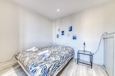 Un ou plusieurs lits dans un hébergement de l'établissement Studio Le Rayon NEUF & Cosy - Gare Parilly