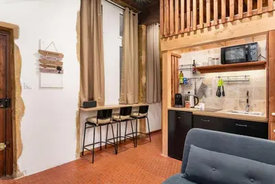 Cuisine ou kitchenette dans l'établissement Le Cocon de Saint-Jean