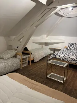 Un ou plusieurs lits dans un hébergement de l'établissement Villa Belle Époque - 18 couchages FEURS 42