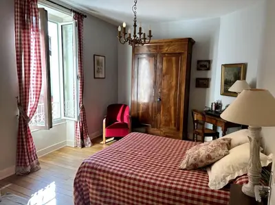 Un ou plusieurs lits dans un hébergement de l'établissement Villa Belle Époque - 18 couchages FEURS 42