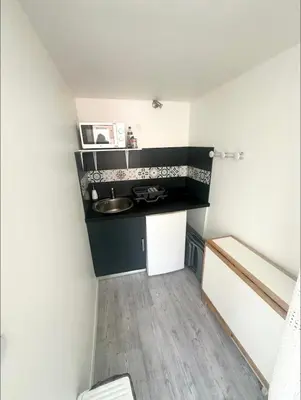 Cuisine ou kitchenette dans l'établissement Studio mezzanine proche métro A