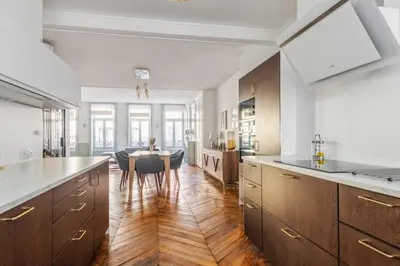 Cuisine ou kitchenette dans l'établissement Appartement Mercier - Welkeys