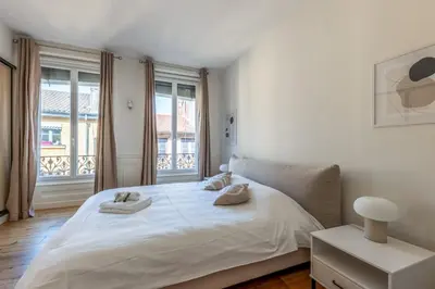 Un ou plusieurs lits dans un hébergement de l'établissement Appartement Mercier - Welkeys