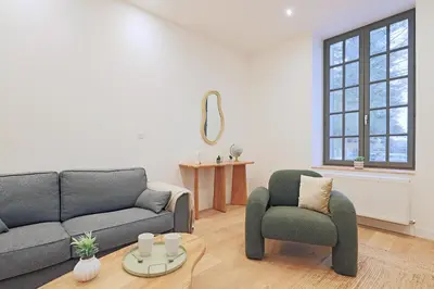 Coin salon dans l'établissement La Maison du Gardien