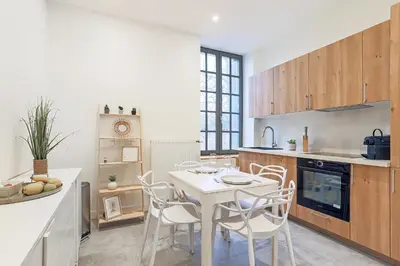Cuisine ou kitchenette dans l'établissement La Maison du Gardien