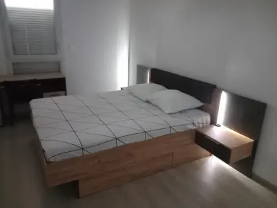 Un ou plusieurs lits dans un hébergement de l'établissement Le Barbusse LYON-T3-Garage-Terrasse-3 lits-Home Cinema