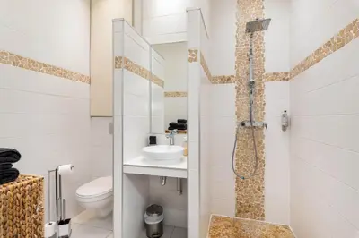 Salle de bains dans l'établissement Le Petit Mercière - Le charme en plein centre