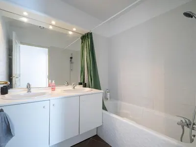 Salle de bains dans l'établissement L'Arlequin Familial et Reposant