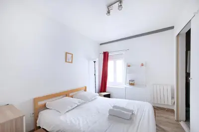 Un ou plusieurs lits dans un hébergement de l'établissement T2 cosy et moderne proche Confluence