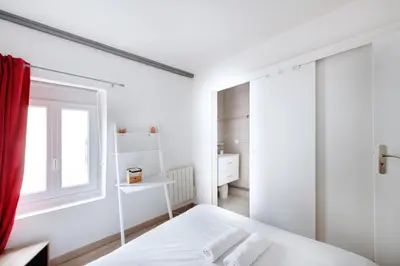 Un ou plusieurs lits dans un hébergement de l'établissement T2 cosy et moderne proche Confluence